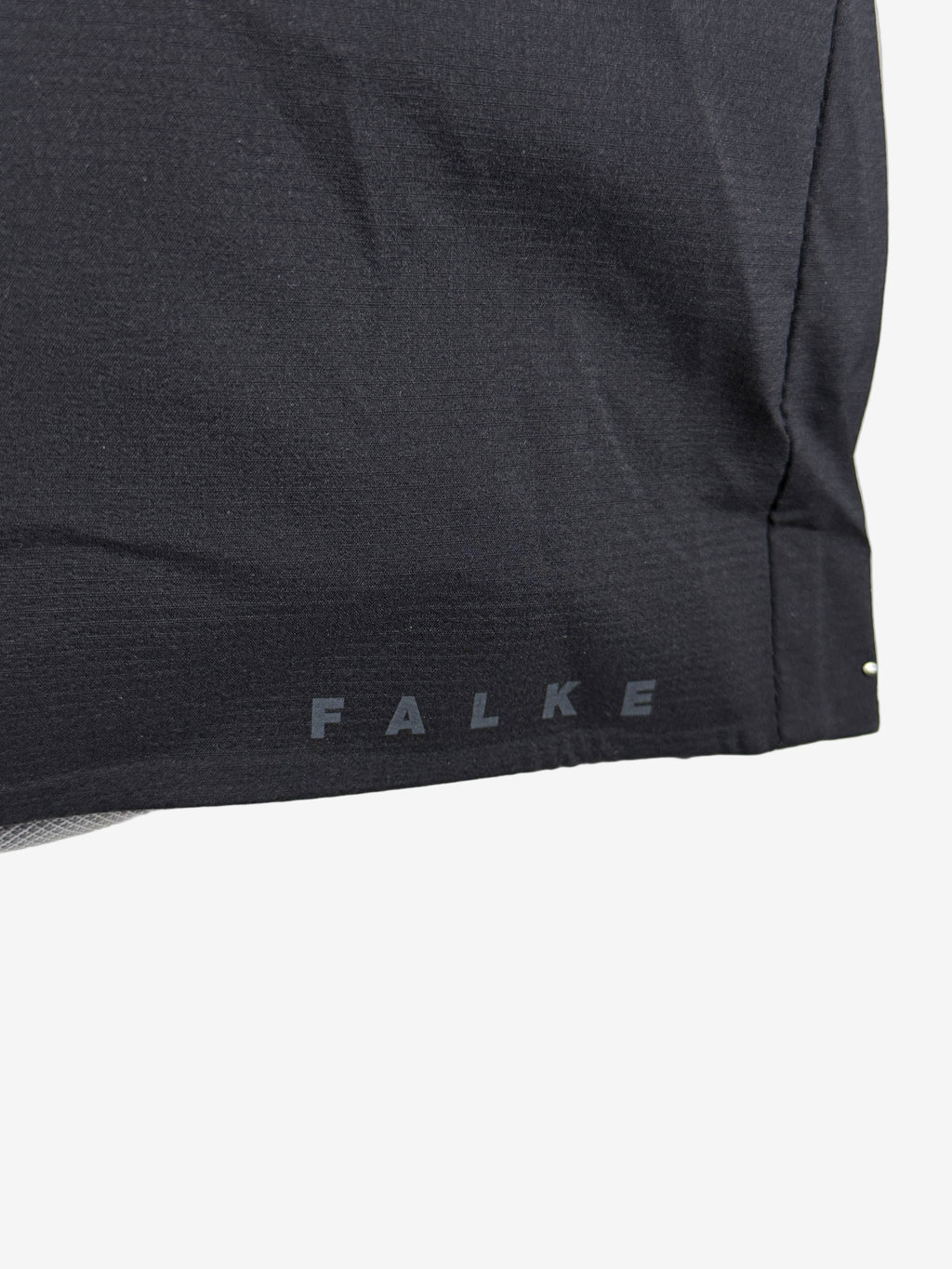 Black sock with 'FALKE' branding on a white background