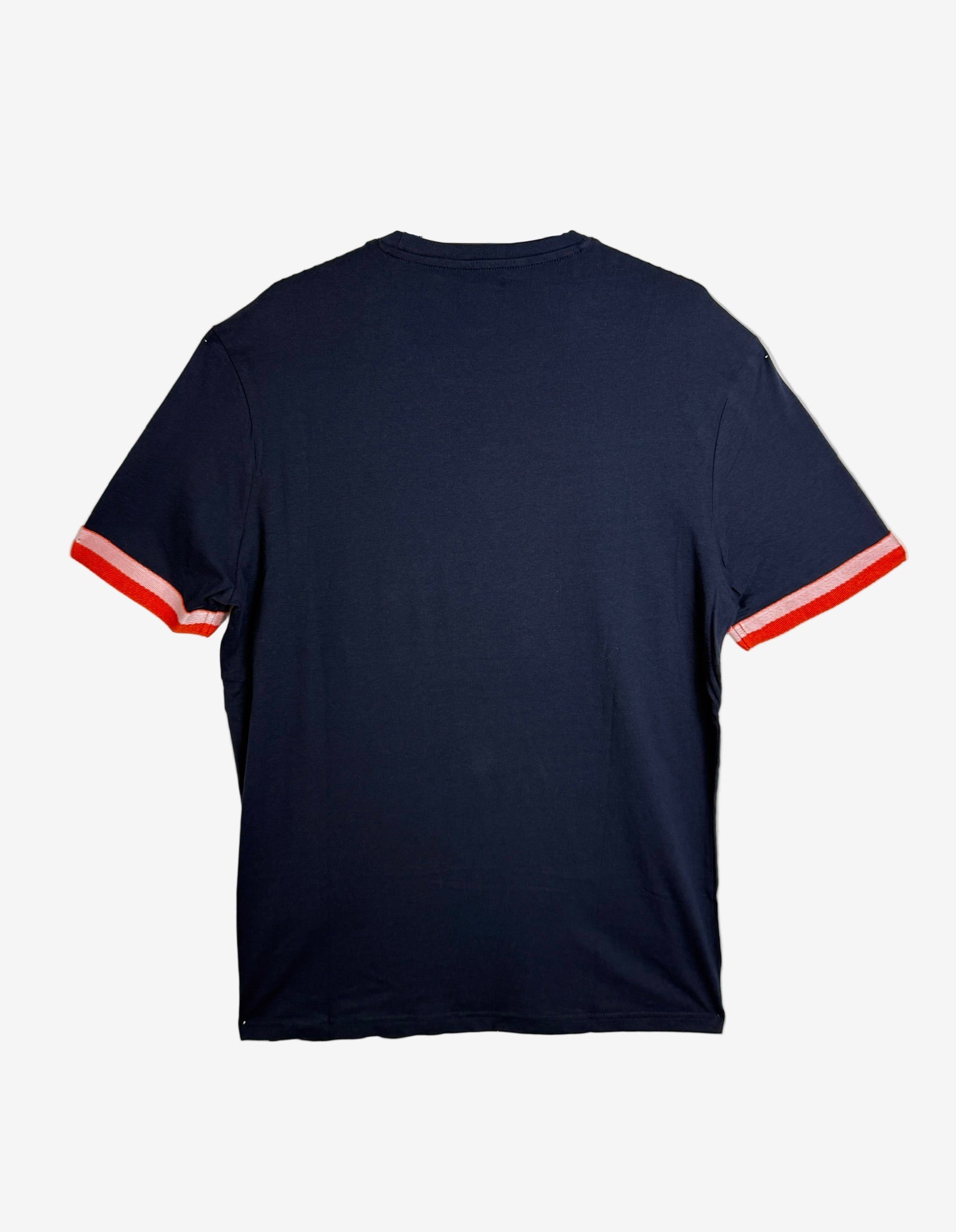 Navy blue t-shirt with red and white trim on a mannequin against a white background