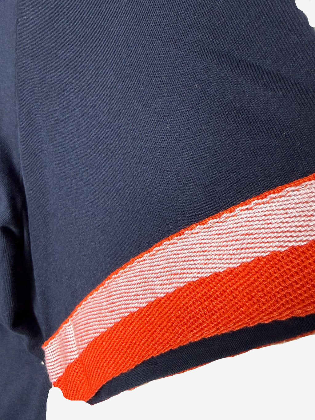 Navy fabric with a red and white striped border