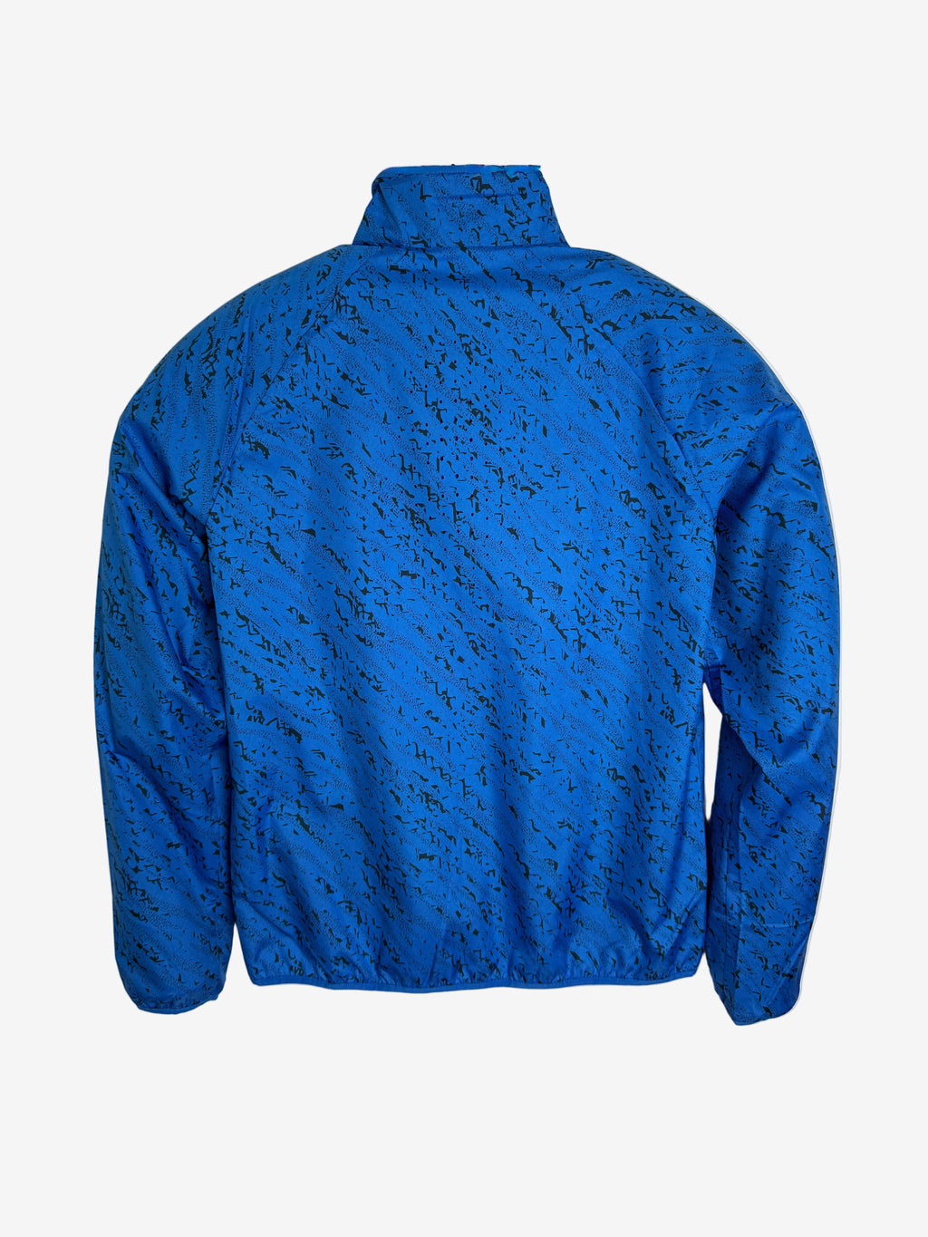 Blue jacket with a subtle pattern on a light gray background