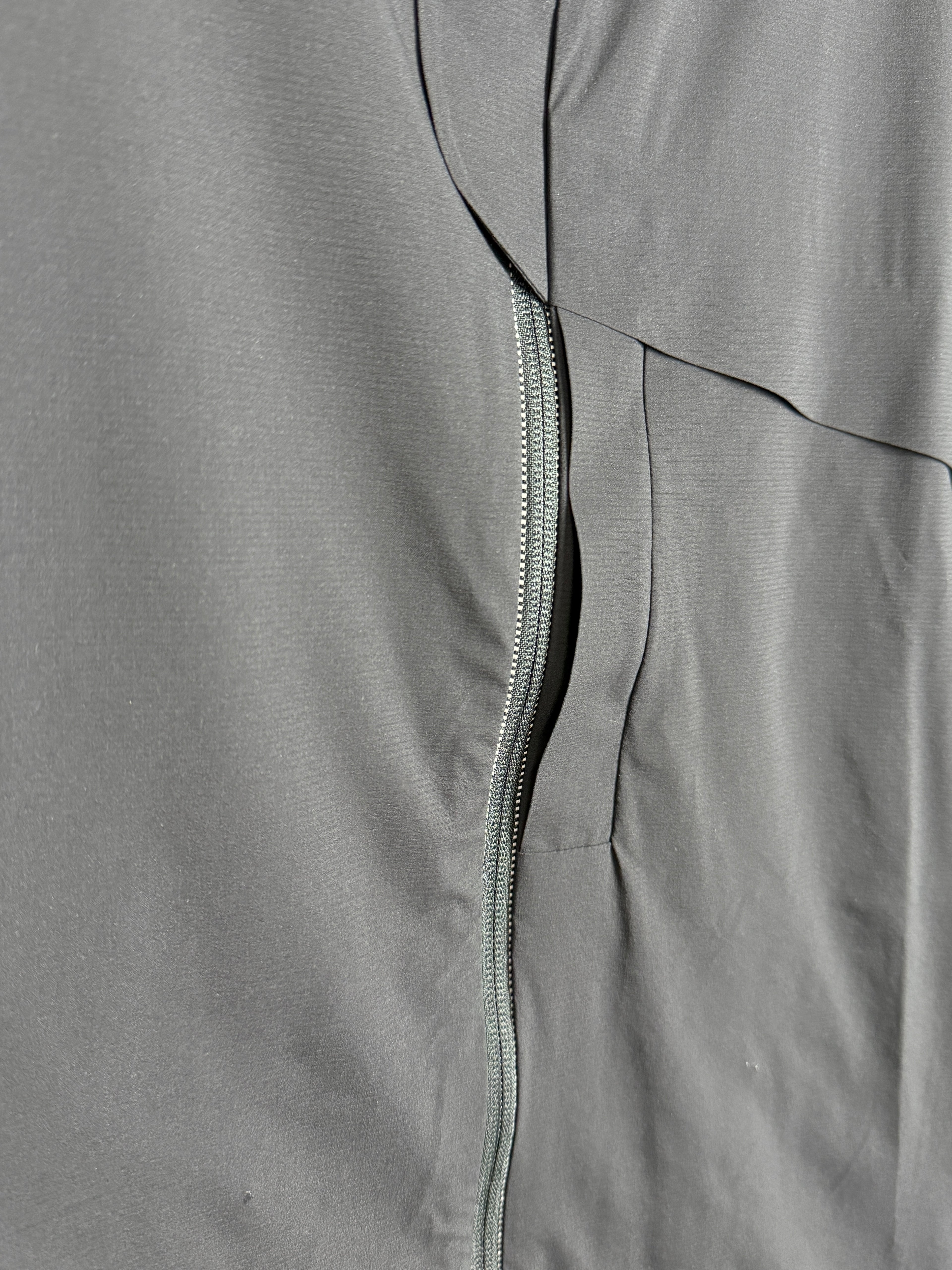 Close-up of a gray fabric with a zipper